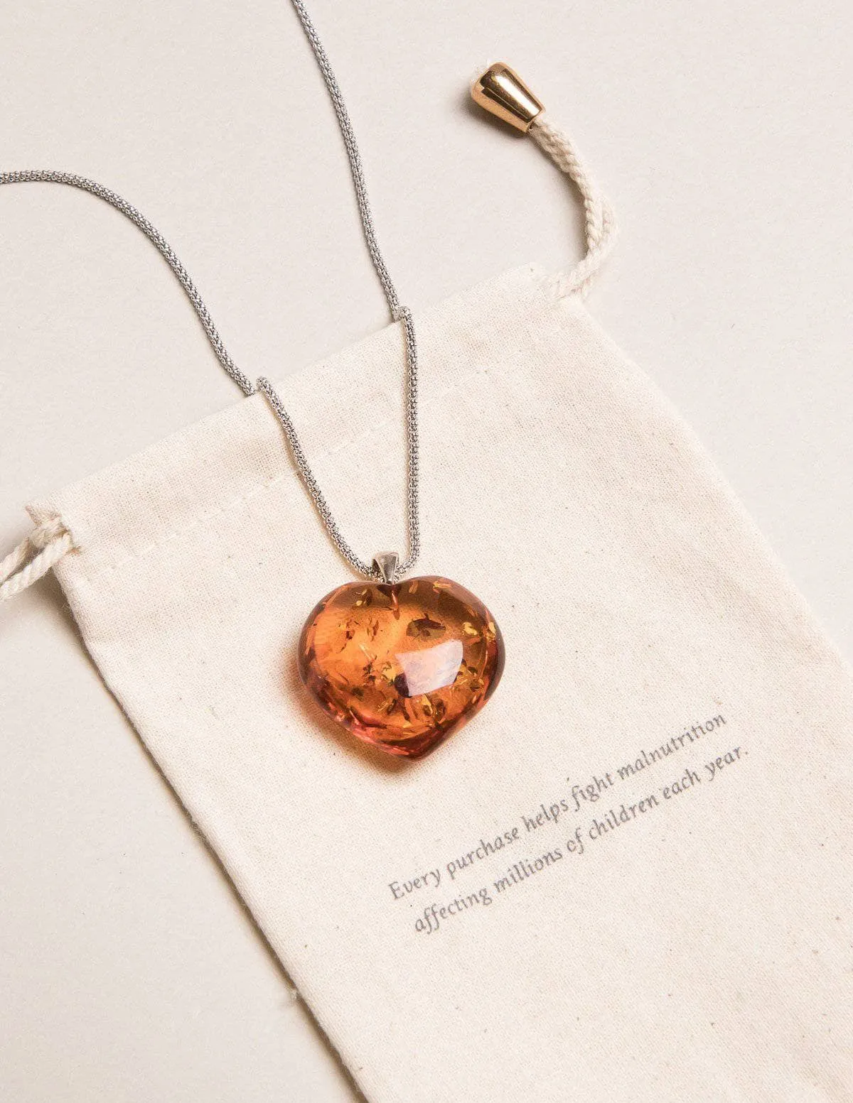 Amber Heart Pendant on Silver Chain