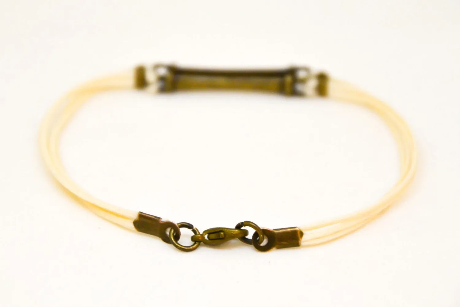 Double bronze bars bracelet for men, beige cord