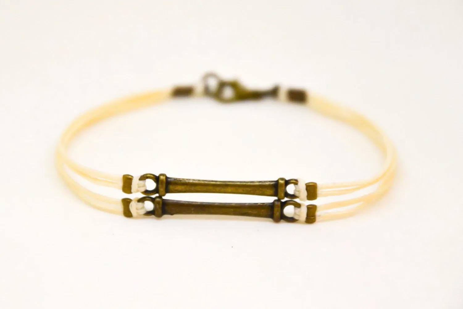 Double bronze bars bracelet for men, beige cord