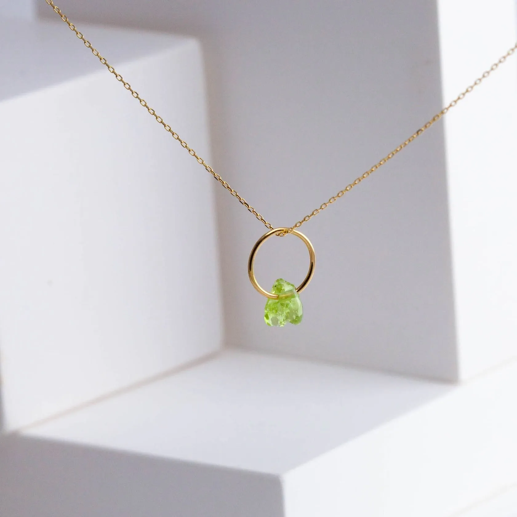 Rough stone peridot pendant