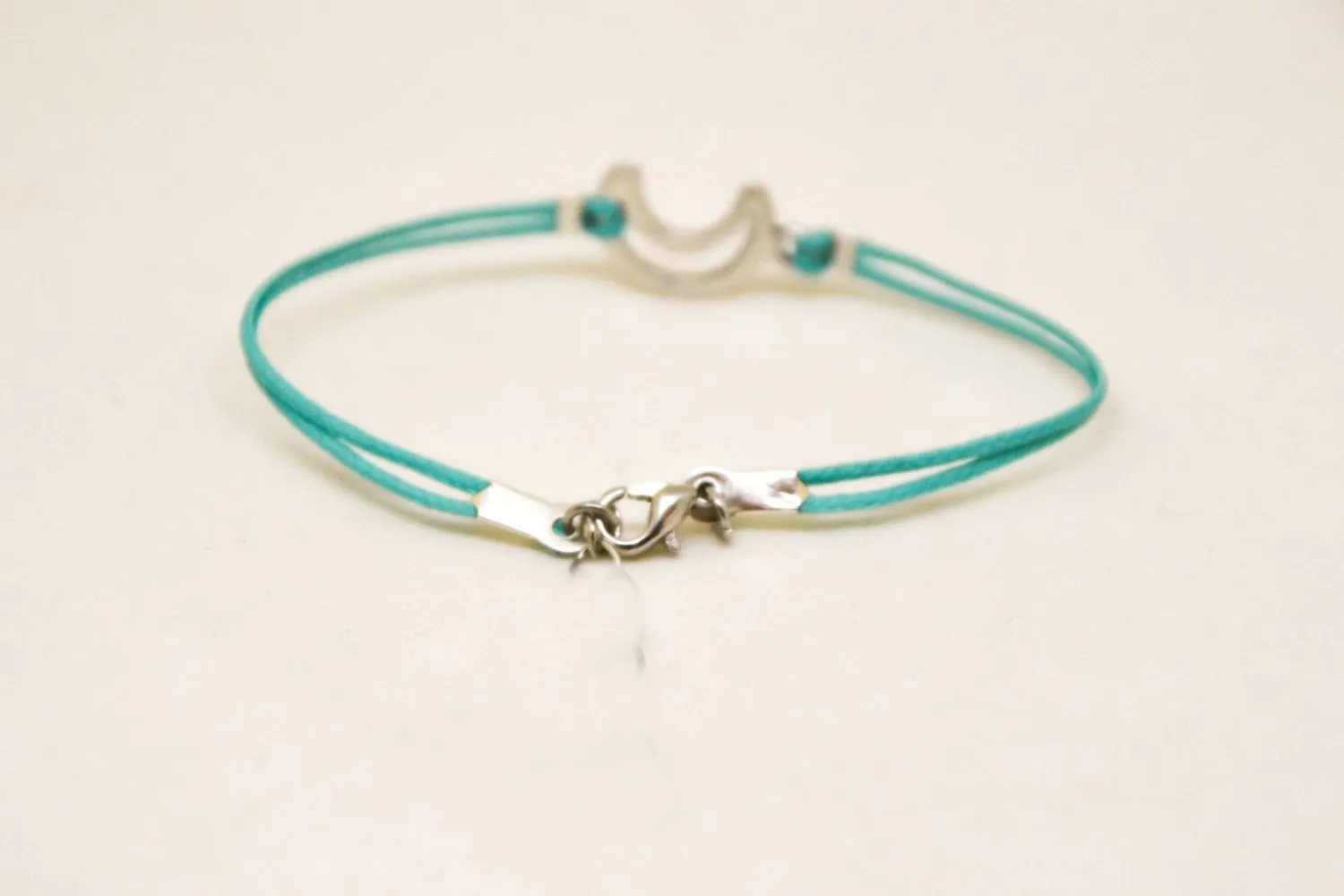 Silver tone crescent moon bracelet for men, turquoise cord, gift for him